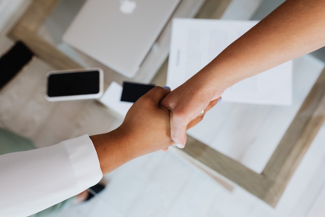 landlord and tenant shaking hands